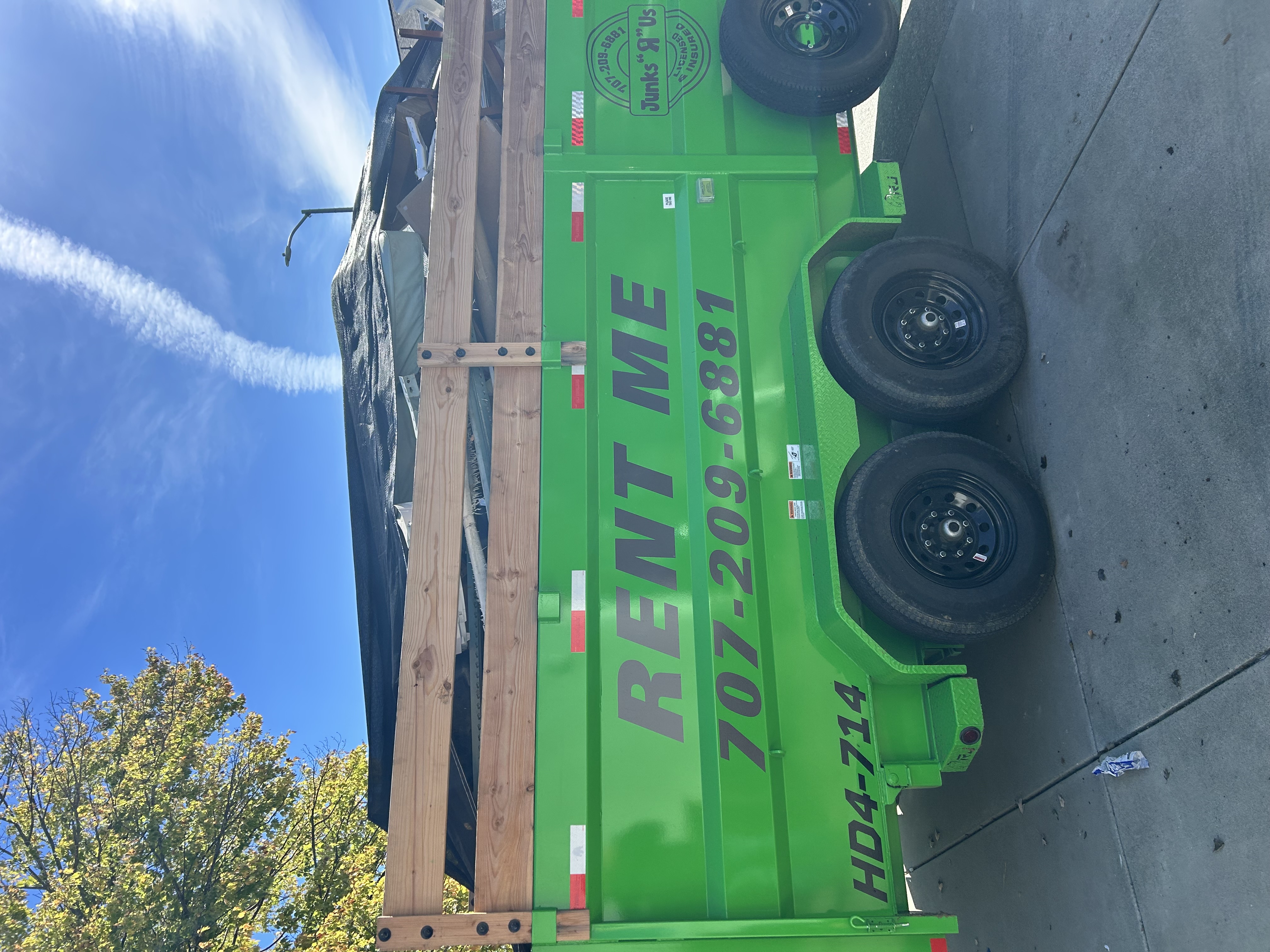 Dump trailer filled with junk removal items